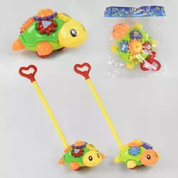 Каталка Черепашка 0391 (48/2) 2 види, з дзвіночком, з ручкою, в пакеті Каталка Черепашка 0391 (48/2) 2 види, з дзвіночком, з ручкою, в пакеті