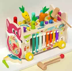 Каталка C 75299 (24) дерев`яна, ксилофон, грядка з морквинами, рухомі шестерінки, гра з “вибиванням” фігурок, годинник, магнітні елементи, в коробці Каталка C 75299 (24) дерев`яна, ксилофон, грядка з морквинами, рухомі шестерінки, гра з “вибиванням” фігурок, годинник, магнітні елементи, в коробці