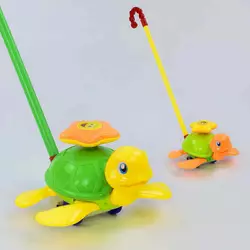Каталка 0361 (72/2) "Черепашка" на паличці рухає ніжками, з брязкальцем, 2 кольори, в пакеті Каталка 0361 (72/2) "Черепашка" на паличці рухає ніжками, з брязкальцем, 2 кольори, в пакеті