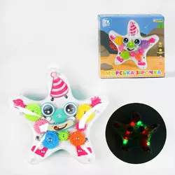 Музична іграшка "Морська зірочка" TK - 21203 (48) "TK Group", ОЗВУЧУВАННЯ УКРАЇНСЬКОЮ МОВОЮ, підсвічування, колесо вільного ходу, шестерні, в коробці Музична іграшка "Морська зірочка" TK - 21203 (48) "TK Group", ОЗВУЧУВАННЯ УКРАЇНСЬКОЮ МОВОЮ, підсвічування, колесо вільного ходу, шестерні, в коробці